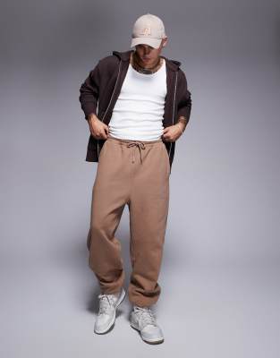 ASOS DESIGN premium heavyweight oversized joggers 400gsm in beige-Brown