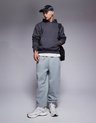 ASOS DESIGN ASOS DESIGN premium heavyweight oversized joggers 400gsm in light washed grey-Green