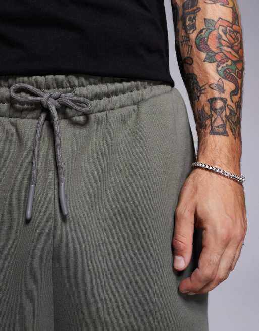 ASOS DESIGN premium heavyweight oversized joggers in khaki, 4 of 5