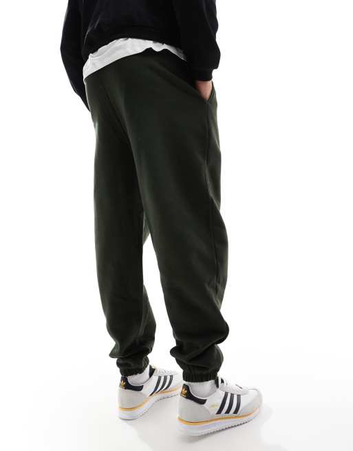 ASOS DESIGN premium heavyweight oversized sweatpants 400gsm in dark green 