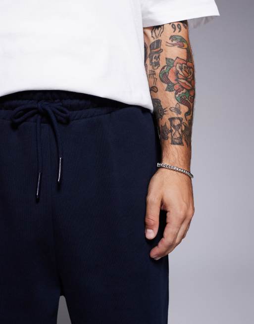 ASOS DESIGN premium heavyweight oversized sweatpants in navy, 4 of 5
