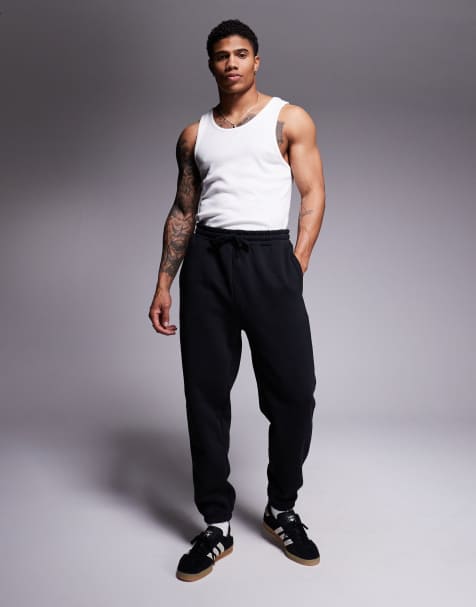 ASOS DESIGN premium heavyweight tapered sweatpants in 400gsm in black - view 1