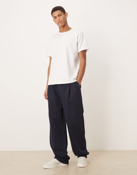 ASOS DESIGN premium heavyweight wide leg sweatpants with pleats in navy - part of a set - view 1