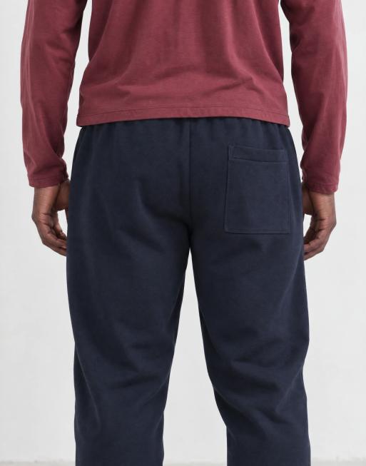 ASOS DESIGN premium kraftiga joggingsbyxor med mudd och tryck i marinblått, 7 av 10