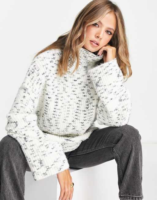 ASOS DESIGN premium longline jumper with high neck in cream and black space dye
