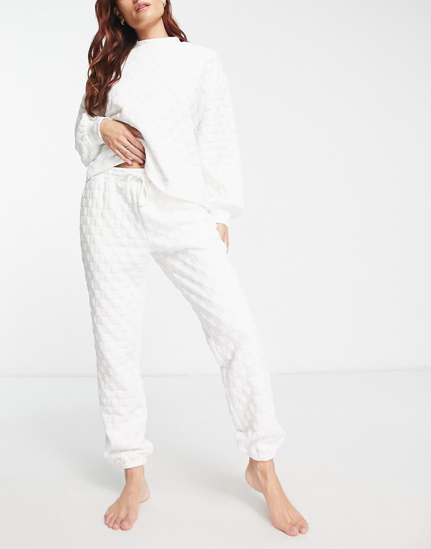 ASOS DESIGN premium lounge quilted check high neck sweat & jogger set in white