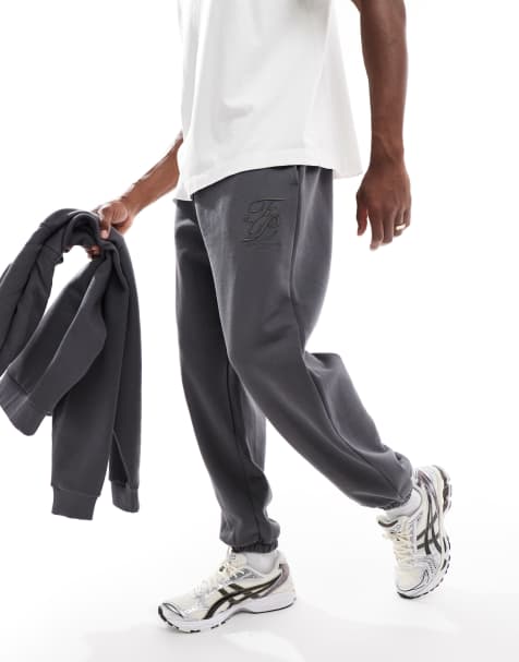 ASOS DESIGN – Premium – Oversize-Jogginghose in Anthrazit mit erhöhtem Print - view 1