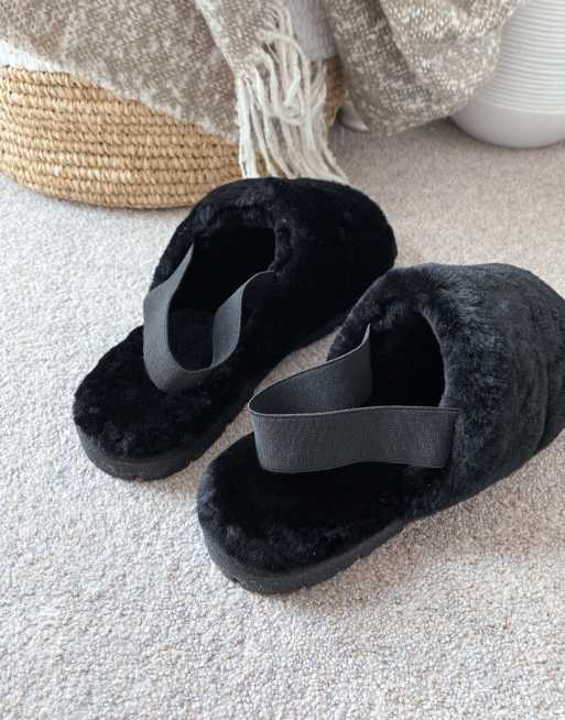 ASOS DESIGN - Premium - Schapenvacht pantoffels met chunky zool en elastische band