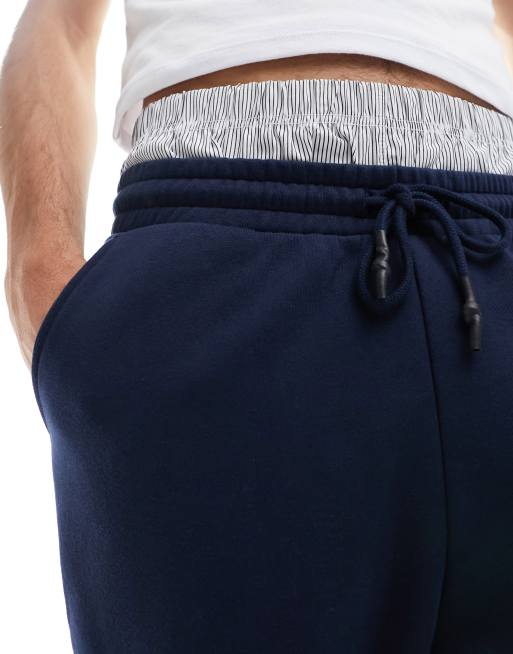 ASOS DESIGN – Premium – Schwere, schmal zulaufende Jogginghose in Marineblau, 3 von 4