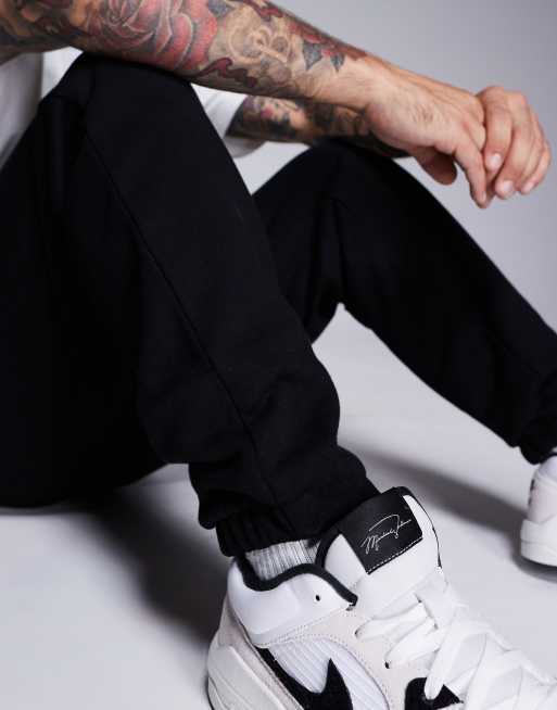 ASOS DESIGN – Premium – Schwere, schmal zulaufende Jogginghose in Schwarz, 400 g/m², 4 von 5