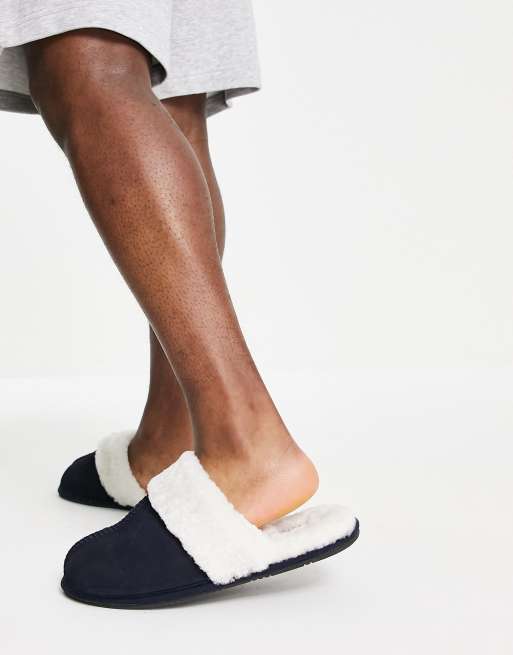 ASOS DESIGN premium sheepskin slippers in navy with cream lining