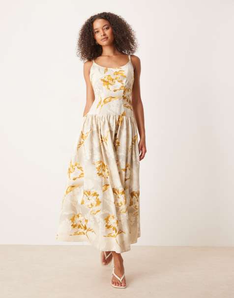 ASOS DESIGN premium strappy seam detail dropped waist midi dress in yellow floral print - view 1