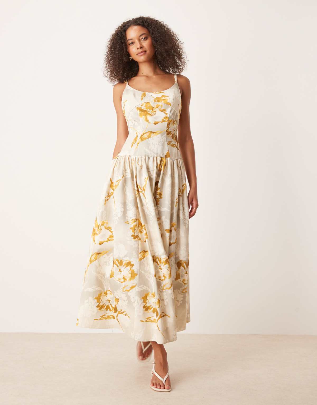ASOS DESIGN premium strappy seam detail dropped waist midi dress in yellow floral print