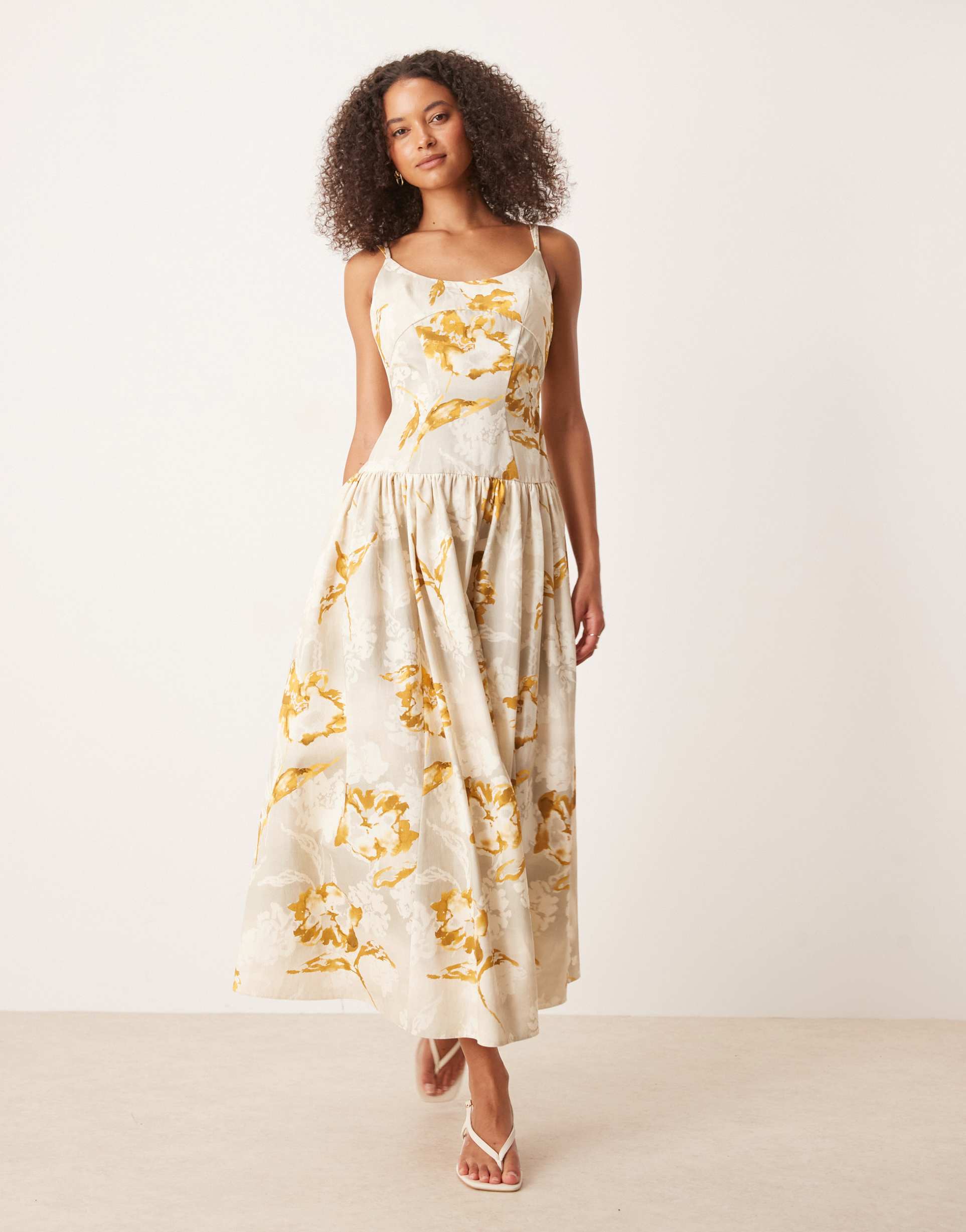 asos design premium strappy seam detail dropped waist midi dress in yellow floral print