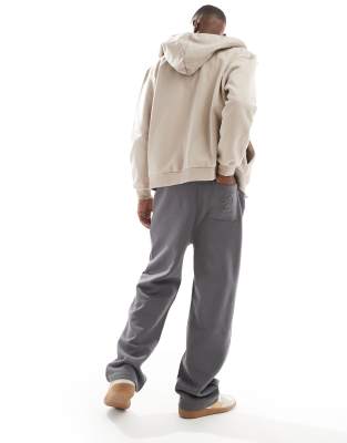 ASOS DESIGN premium wide leg trackies with high build print in charcoal ...
