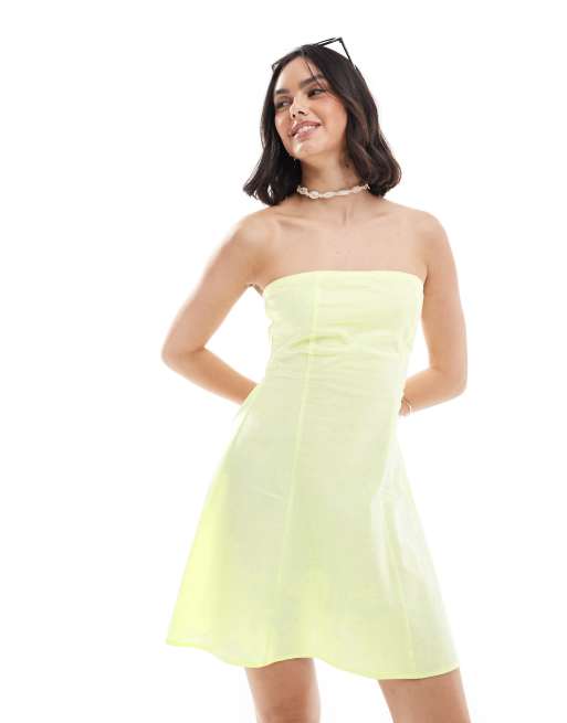 ASOS DESIGN - Prendisole a fascia corto in lino color limone