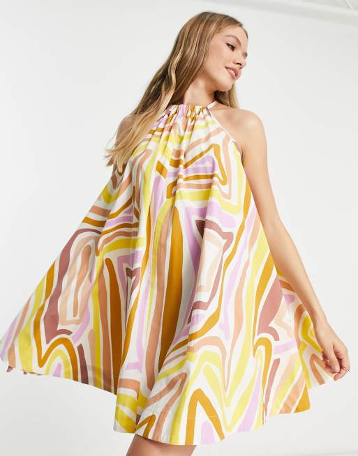 ASOS DESIGN - Prendisole corto voluminoso in cotone con stampa astratta rétro
