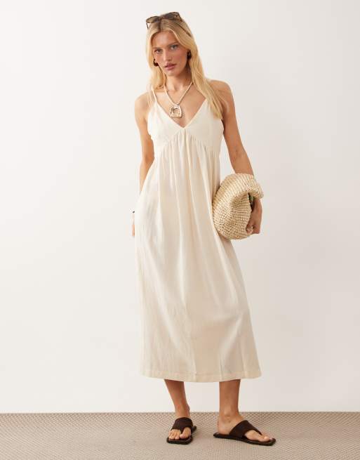 ASOS DESIGN - Prendisole lungo in misto lino color avorio con scollo a V profondo