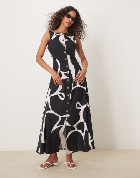 ASOS DESIGN - Prendisole lungo stile gilet nero con stampa astratta, scollo a barchetta e bottoni - view 1