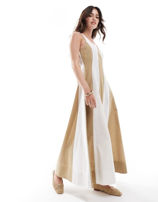 ASOS DESIGN - Prendisole lungo stile tennis marrone a righe con cuciture a vista