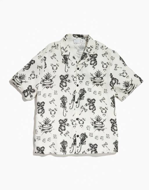 ASOS DESIGN - PRIDE - Genderloos ruimvallend overhemd met korte mouwen, reverskraag en print in wit