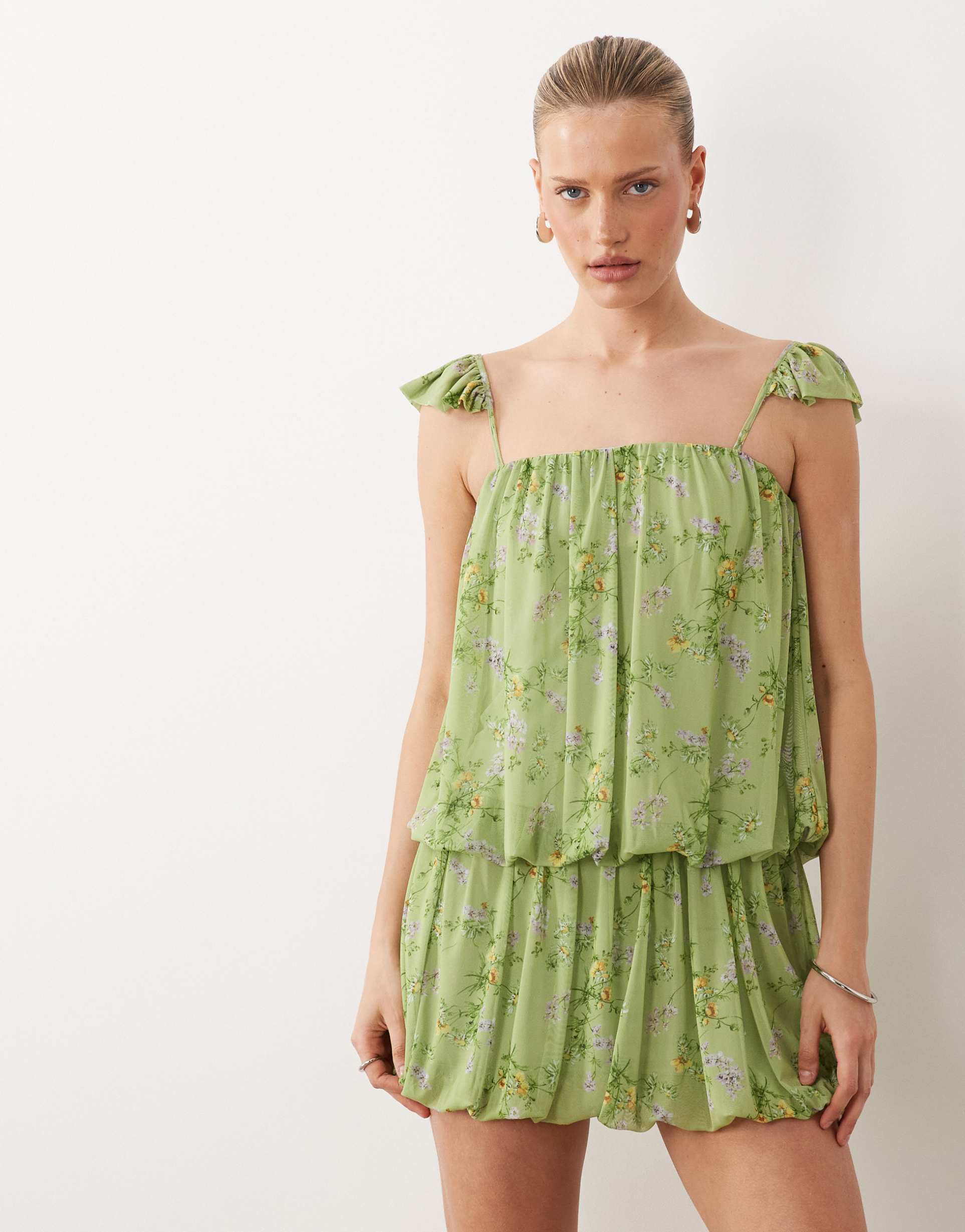asos design printed bubble hem mini dress in green floral