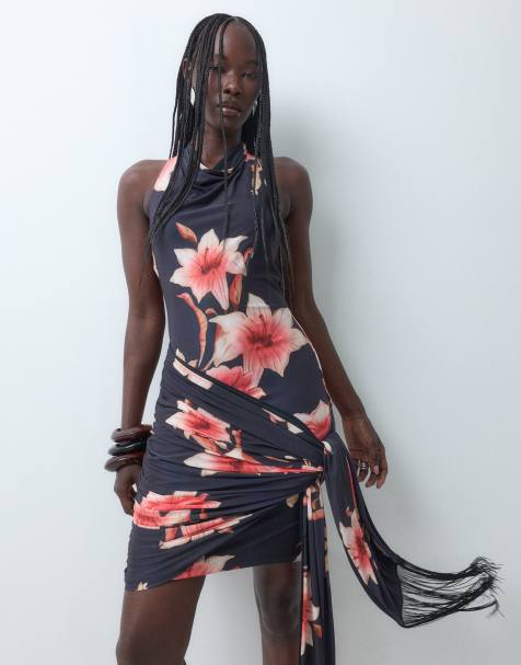 ASOS DESIGN printed floral slinky high neck cowl mini dress with fringe sash in black - view 1