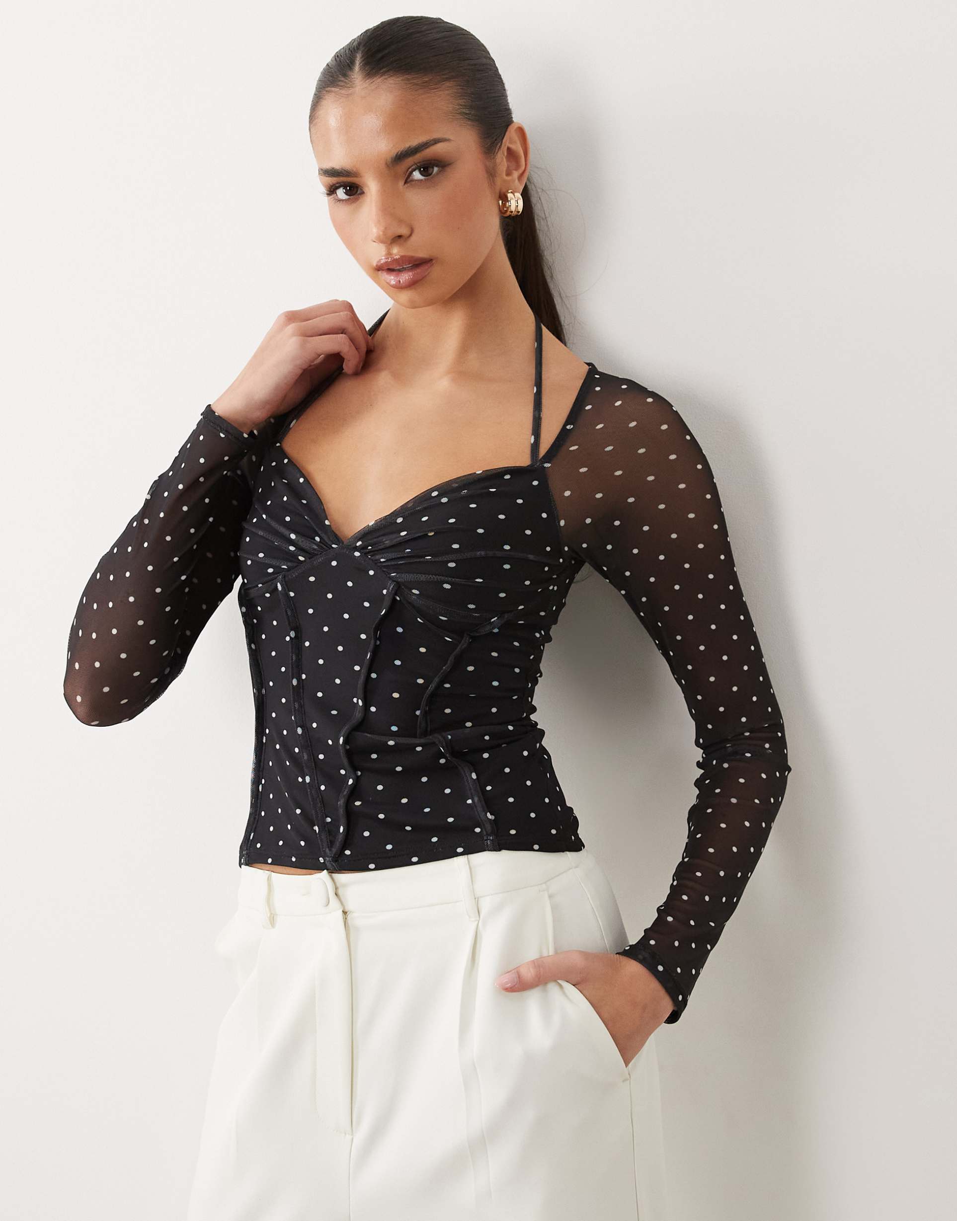 asos design printed mesh exposed seams long sleeve top in polka dots