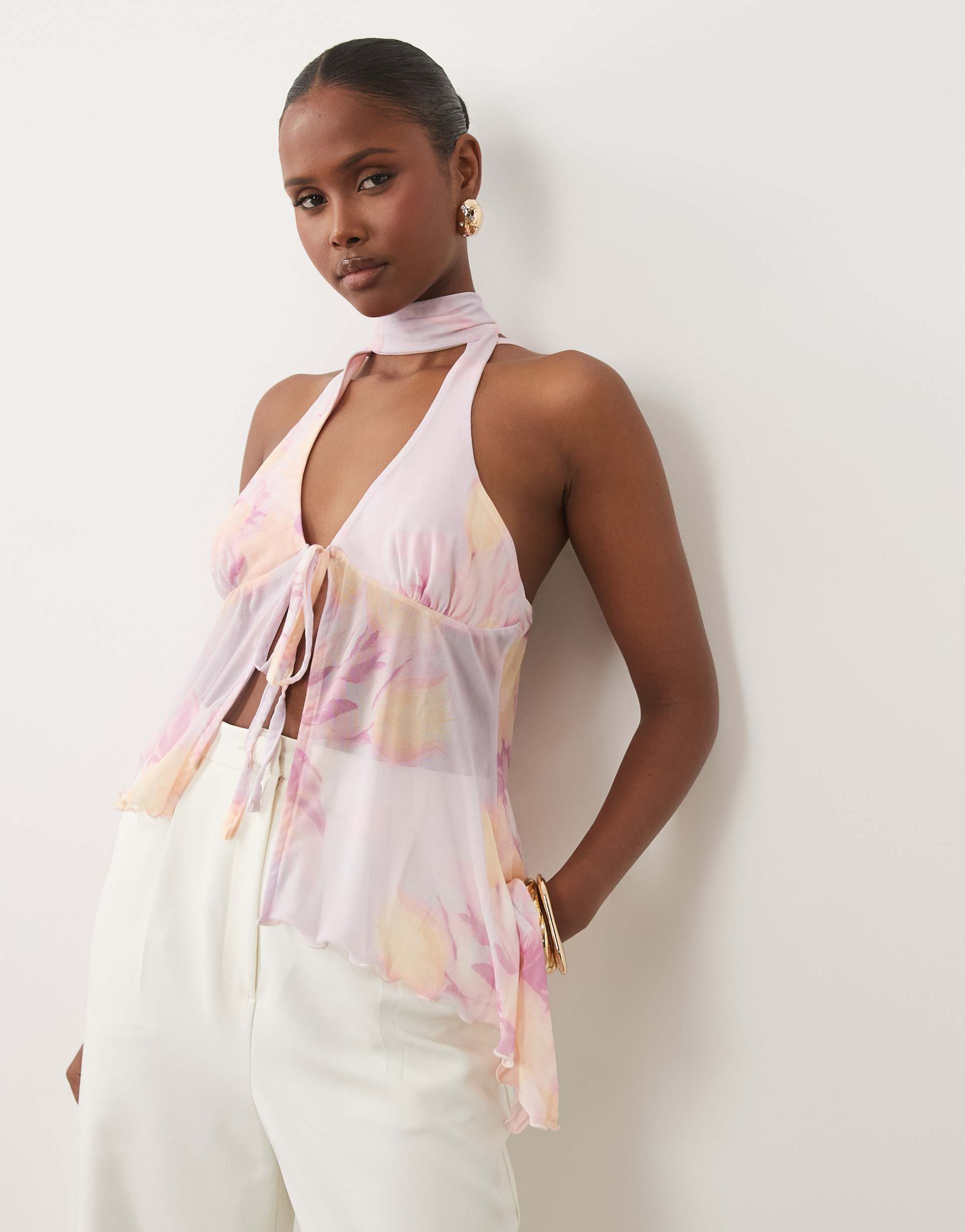 asos design printed mesh tie front asymmetric hem halter top in lilac floral print