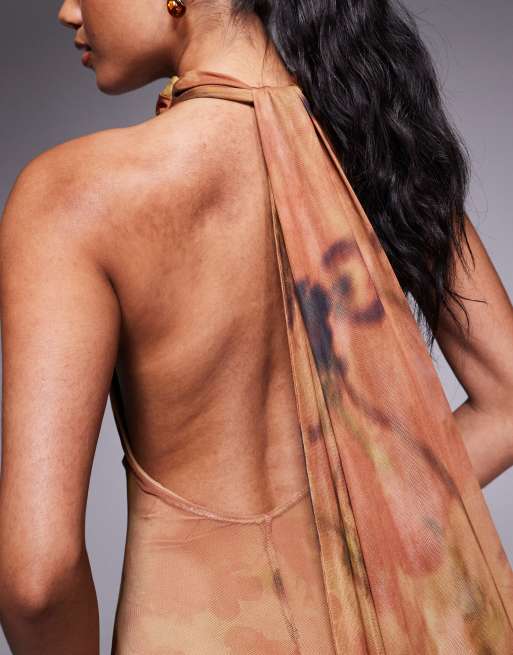 ASOS DESIGN printed mesh twist bust detail halter maxi with tie back neck in burnt orange floral