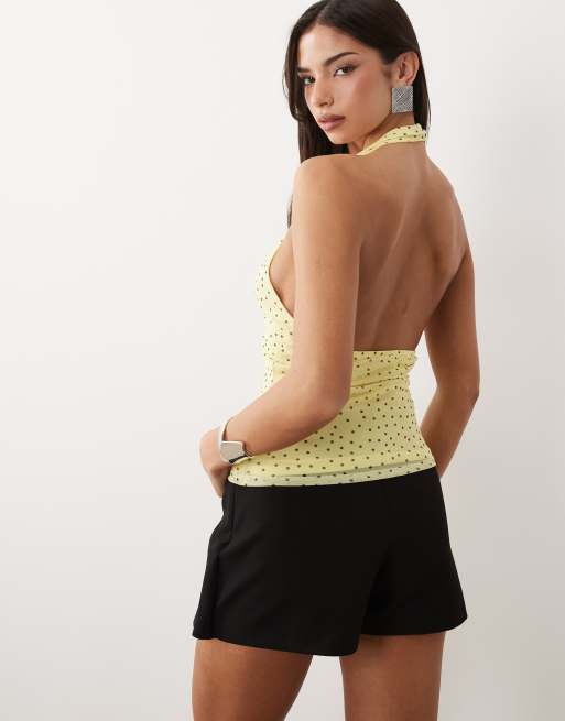 ASOS DESIGN printed mesh u scoop ruched halter neck top in yellow and brown polka dot, 4 of 4