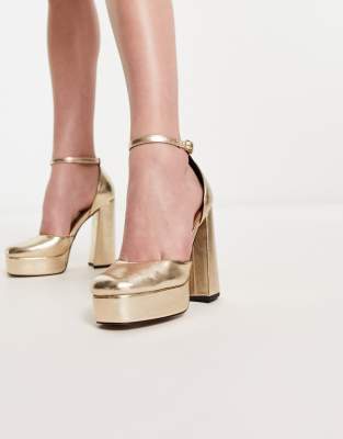 ASOS DESIGN - Priority - Schuhe mit Plateausohle und hohem Absatz in Gold-Goldfarben