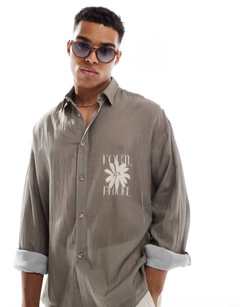 ASOS DESIGN boxy 90s oversized textured sheer shirt with chest print in brown