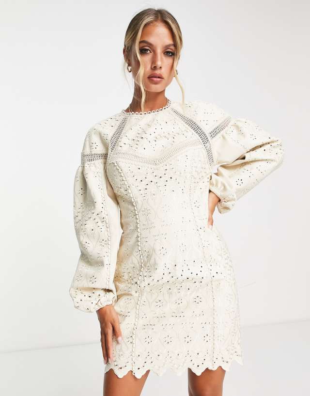 ASOS DESIGN PU broderie mini dress with lace inserts in cream