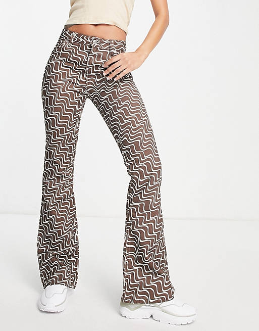 ASOS DESIGN puddle flare pants in chocolate wavy print