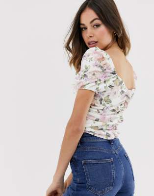 ASOS DESIGN puff sleeve corset top with lace up front in floral print