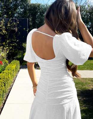 white ruched dress with puff sleeves