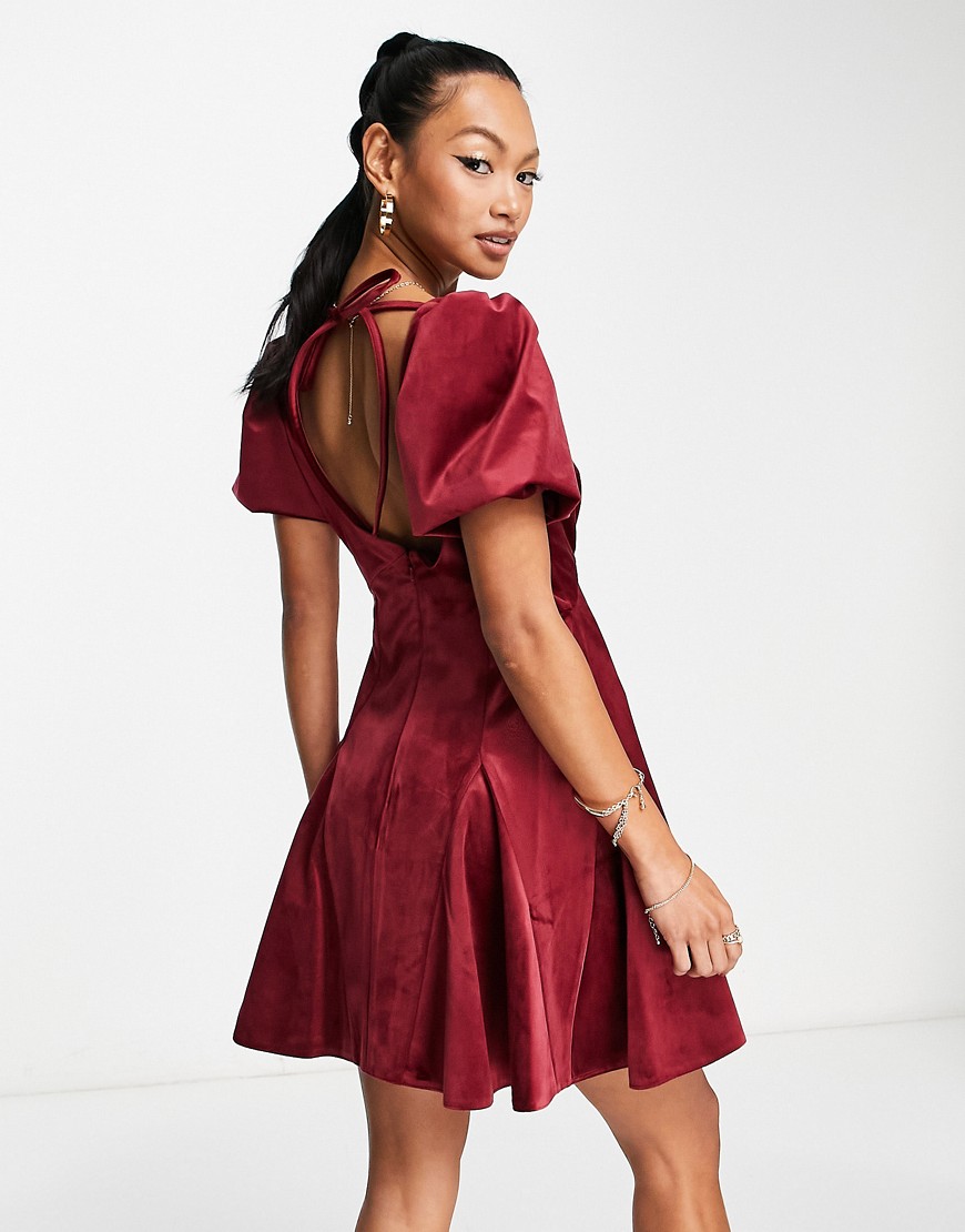 ASOS DESIGN puff sleeve velvet mini dress with godet detail in burgundy-Red