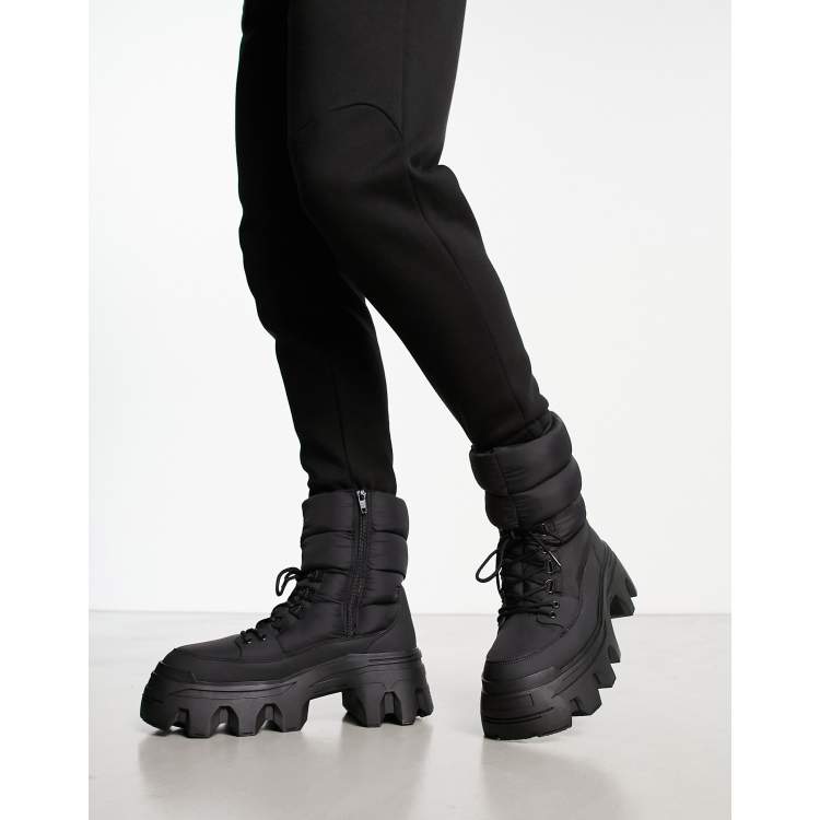 ASOS DESIGN puffer boots with chunky sole in black nylon