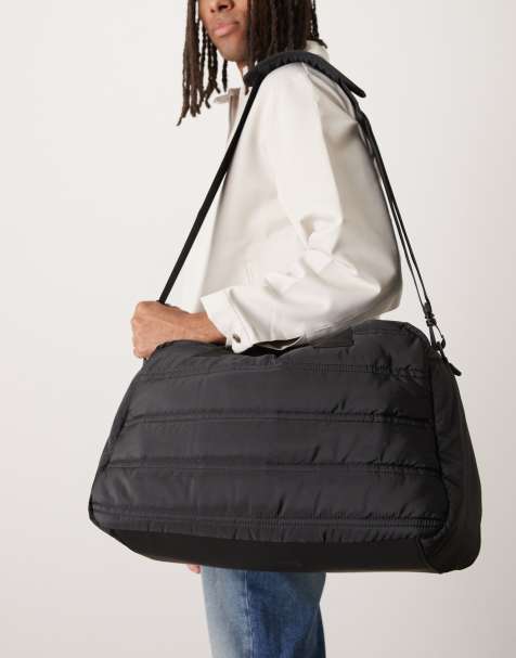 ASOS DESIGN puffer carry-all bag in black - view 1