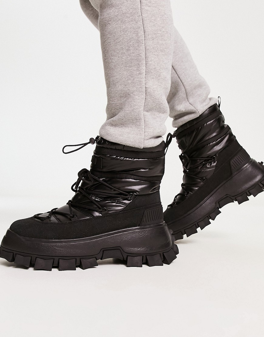 ASOS DESIGN puffer chelsea boot on chunky sole with lace detail in black wet look nylon