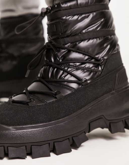 ASOS DESIGN puffer chelsea boot on chunky sole with lace detail in black  wet look nylon