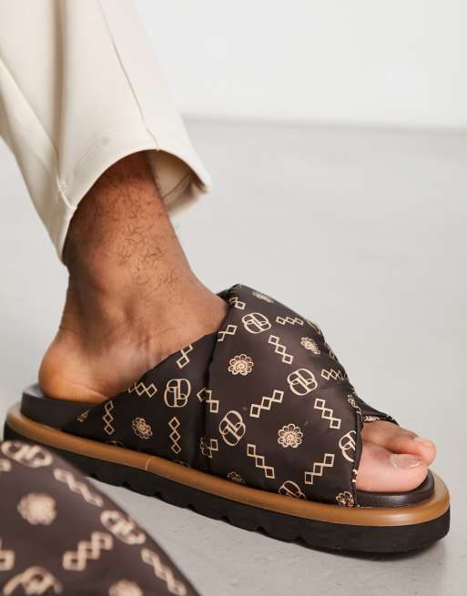 ASOS DESIGN slip on sandals in brown monogram print