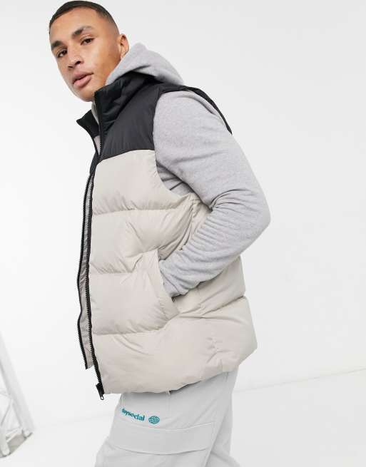 ASOS DESIGN puffer gilet in cream with contrast panel