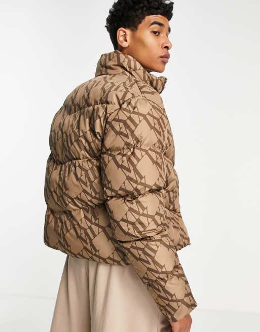 ASOS DESIGN puffer jacket in brown monogram print