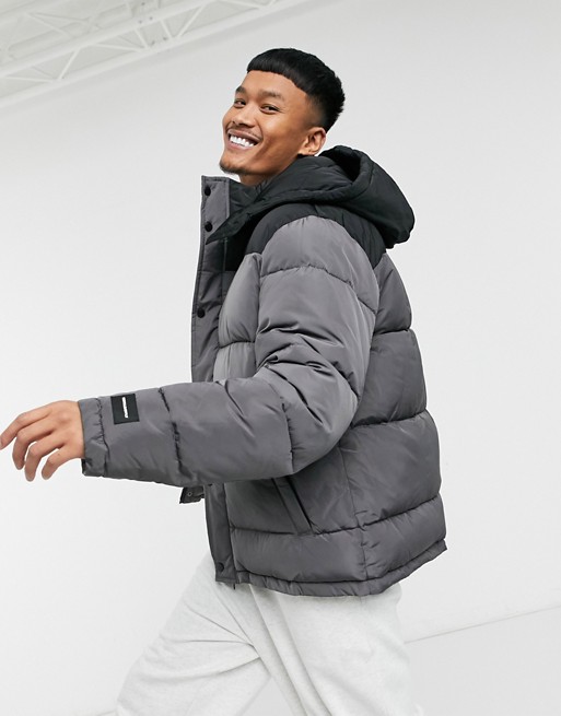 ASOS DESIGN puffer jacket with colourblock panel in charcoal