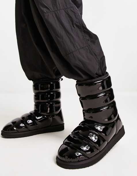 ASOS DESIGN puffer slipper boots in black gloss - view 1