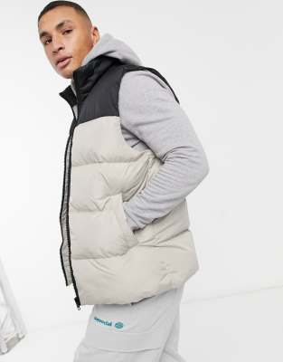 cream puffy vest