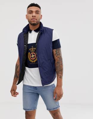 vest and polo shirt