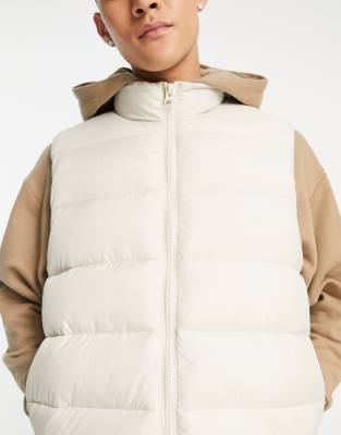 beige puffy vest